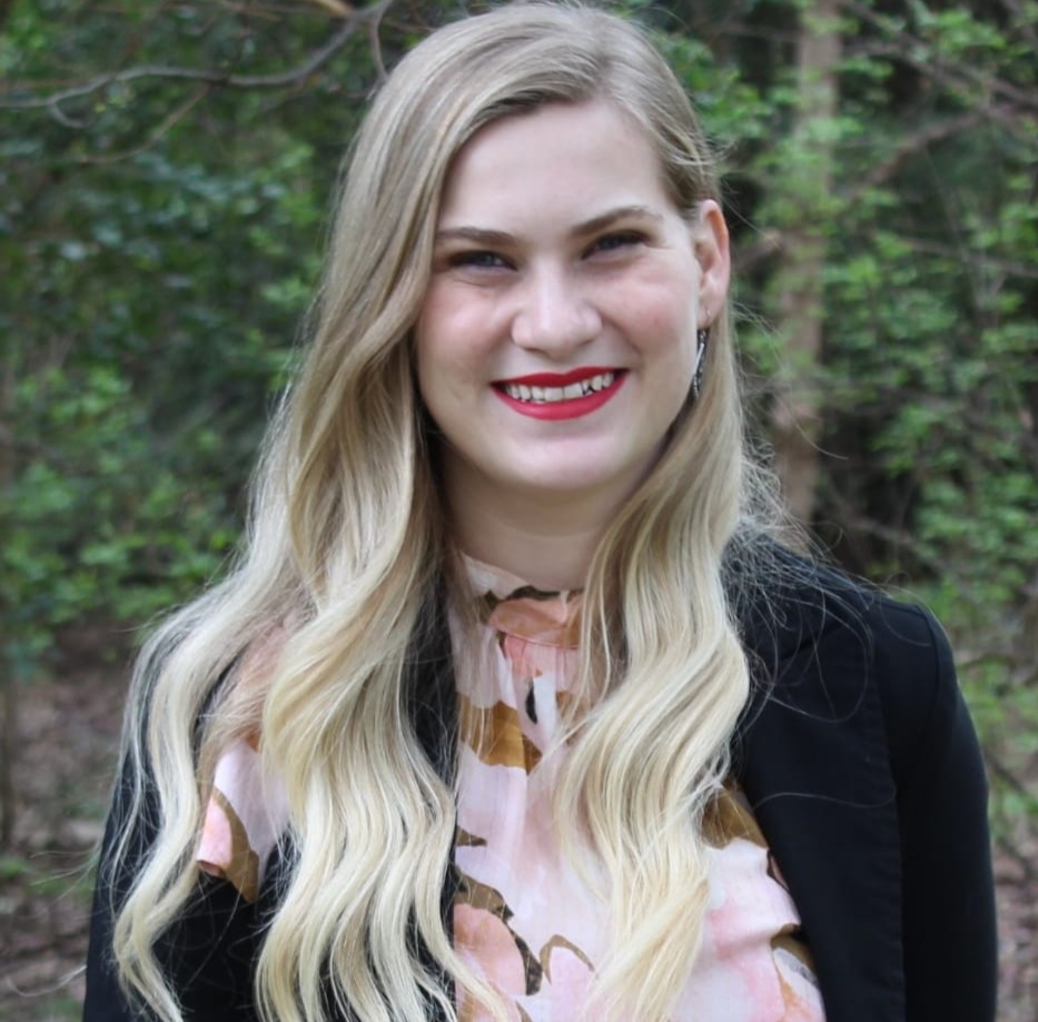 A photo of a woman in a black jacket.